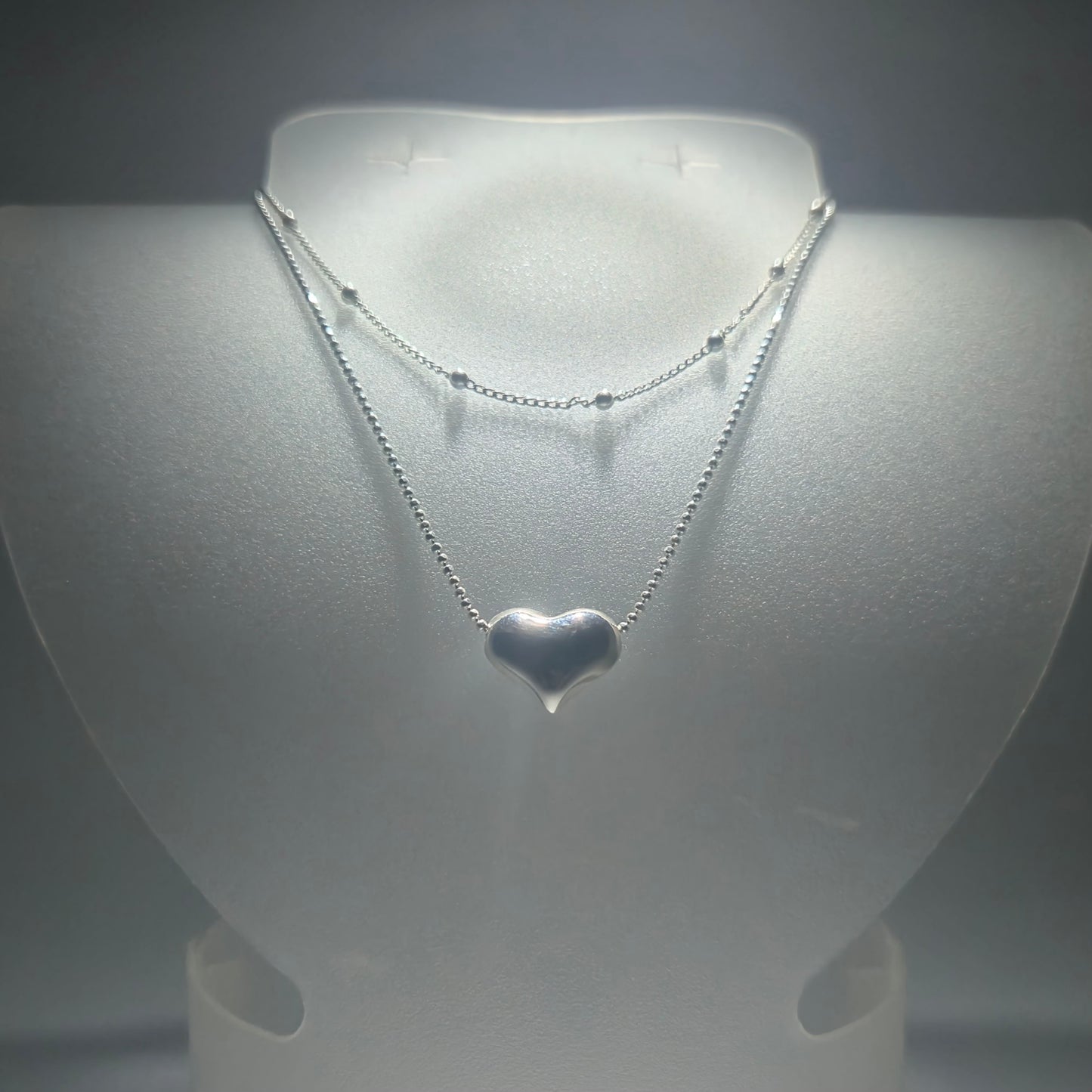Silver double necklace with a chunky silver heart