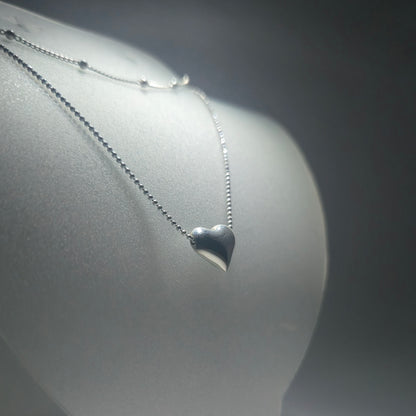 Silver double necklace with a chunky silver heart