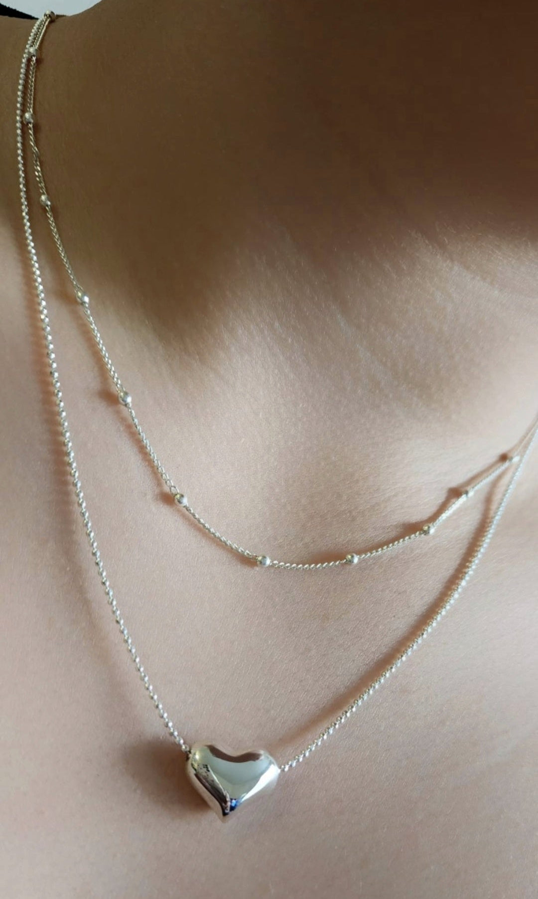 Silver double necklace with a chunky silver heart