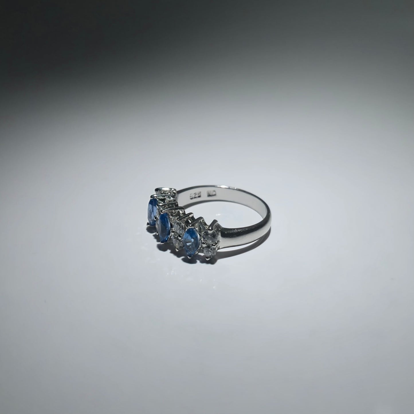 Silver ring with zirconia stones shaped like a crown