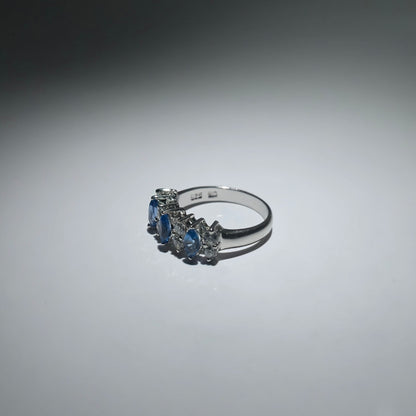 Silver ring with zirconia stones shaped like a crown