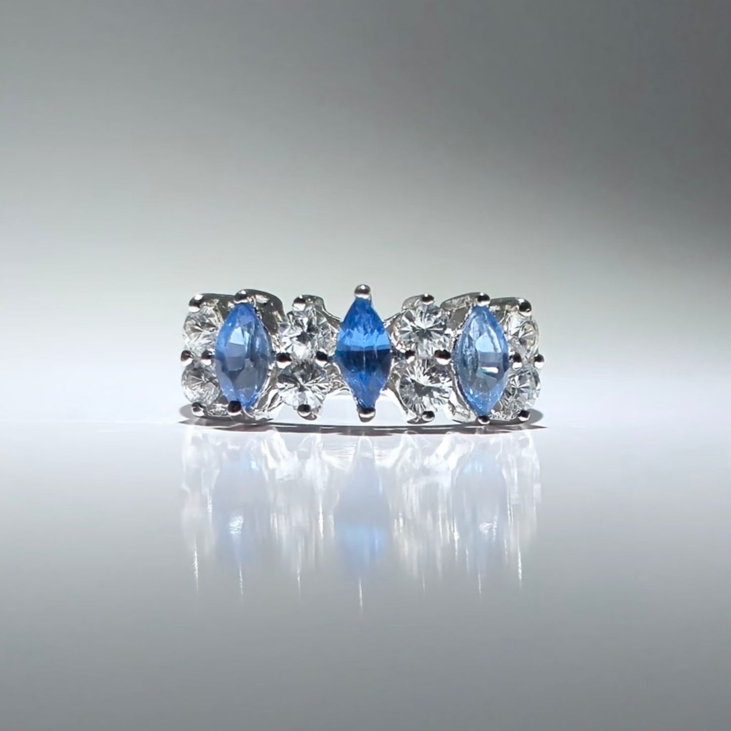 Silver ring with zirconia stones shaped like a crown
