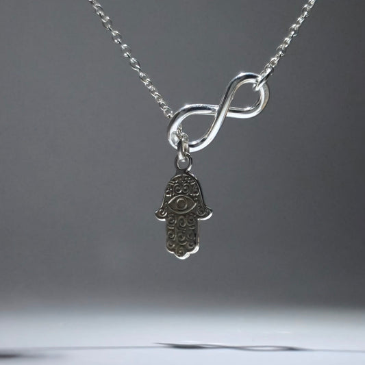 Silver Feather Pendant with infinity figure