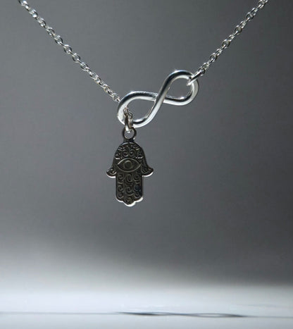 Silver Feather Pendant with infinity figure