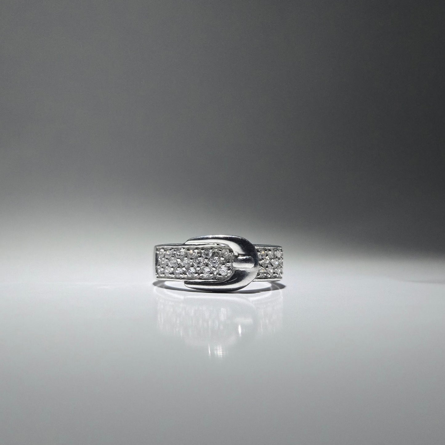 Silver ring with zirconia stones shaped like a cute belt