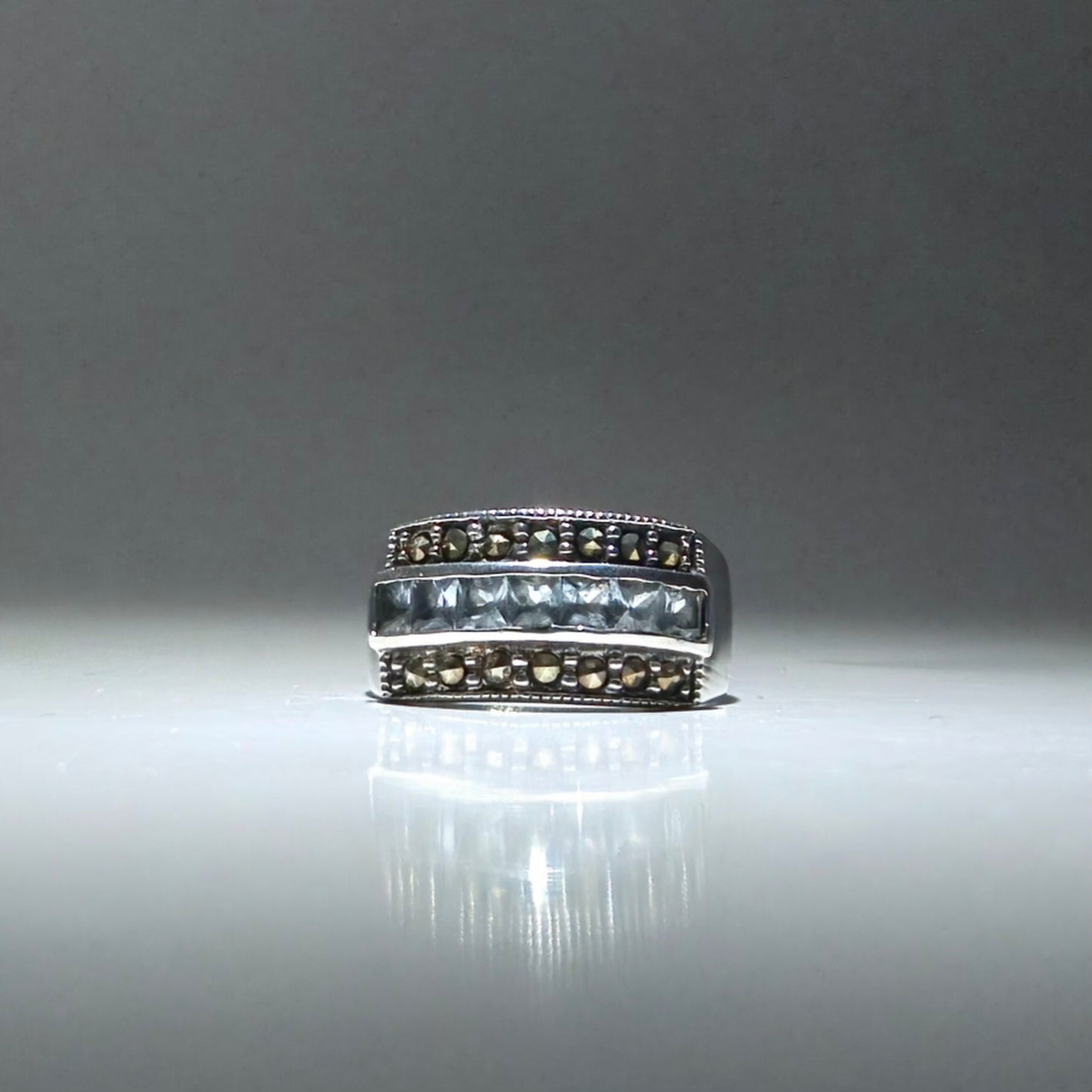 Silver ring engraved with pyrite and zirconia stones