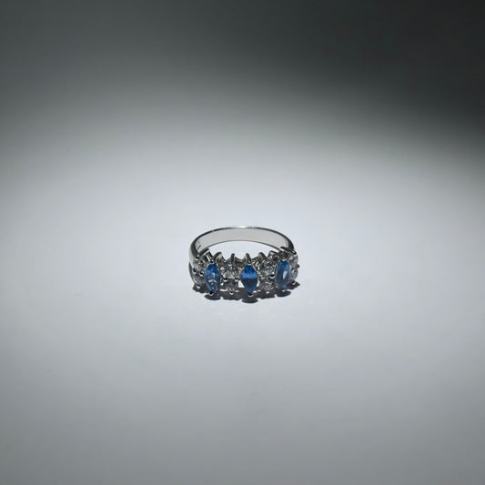 Silver ring with zirconia stones shaped like a crown