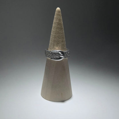 Silver ring with zirconia stones shaped like a cute belt