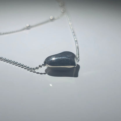 Silver double necklace with a chunky silver heart