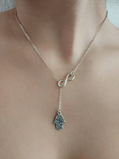 Silver Feather Pendant with infinity figure