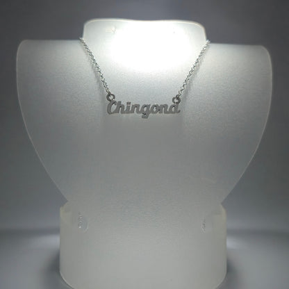 Silver chain necklace with the phrase "chingona" in silver
